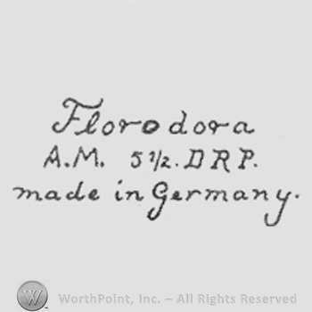 Hand lettered on 3 rows: Florodora, A.M. 5 1/2 DRP., made in Germany