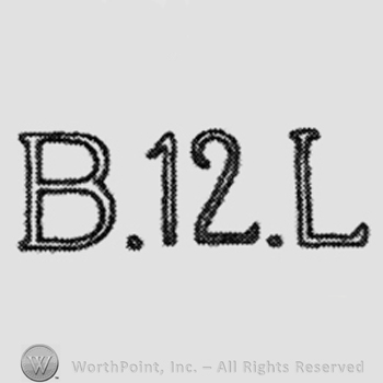 B.12.L. written with capital letters