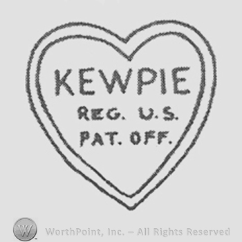 Kewpie Reg. U.S. Pat. Off. Written on a heart shape