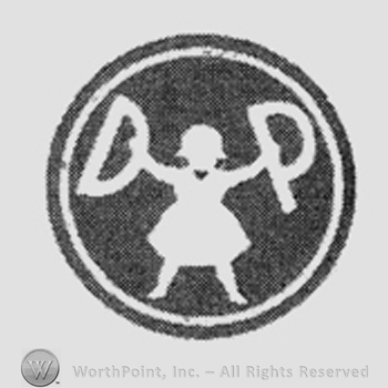 Baby girl holding a letter in each hand: D, P, inside a black circle