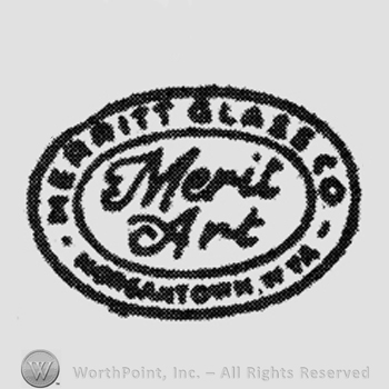 "Merit Art": handwritten on two lines in a circle, "Merritt Glass Co" written above, "Morgantown W Va" written below, inside the circular frame