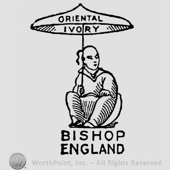 Asian figure holding a sun umbrella with inscription Oriental Ivory. Bishop England written below on two rows