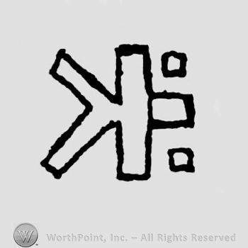 Inverted letter K, three small squares on the right, the one in the middle, larger then the other ones