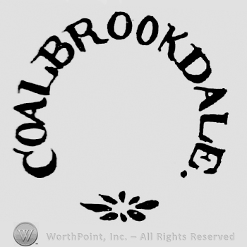 Coalbrookdale, capital and curved written. Flower below