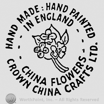 Small flower bouquet in the center. Two rows of writings around it: Hand made: Hand Painted, Crown China Crafts Ltd.,  In England, China Flower