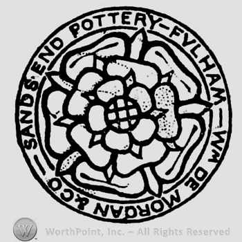 Rose in the middle. Sandsend Pottery Fvlham Wm De Morgan & Co written inside a circular frame