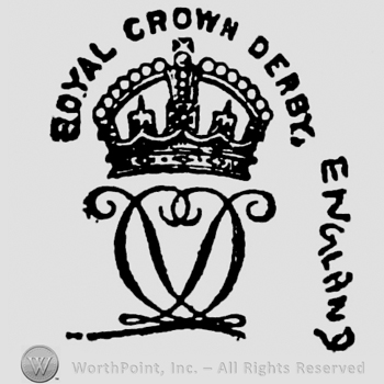 Royal Crown Derby curved written above crown containing pearls, cross, two fleur-de-lis. Two lines forming an X over a heart. England vertical written on the right side