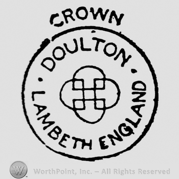 Crown written above. Design on circular panel: stylish cross in the middle. Doulton above, Lambeth England below