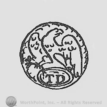 Circle enclosing an eagle and initials T and D bellow.