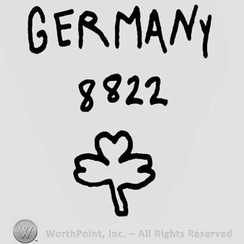 Germany written with uppercase letters over number 8822 and a stylized four-leaf clover