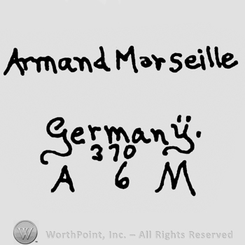 Armand Marseille Germany written with lowercase letters over number 370 and uppercase A and M written on the sides of number 6