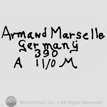 Armand Marseille Germany written with lowercase letters over number 390 and uppercase A and M written on the sides of number 11/0