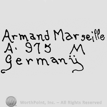 Armand Marseille written with lowercase letters over uppercase A, number 975 and uppercase M, Germany written below with lowercase letters