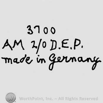 Number 3700 over uppercase AM, number 2/0, uppercase D.E.P., Made in Germany written below with lowercase letters