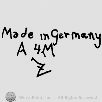 Made in Germany written with lowercase letters over uppercase A and M framing number 4, stylized uppercase Z below