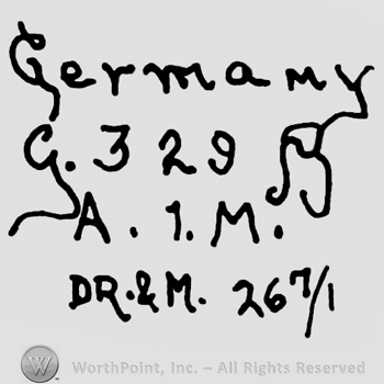 Germany written with lowercase letters over uppercase handwritten G, number 329, uppercase A, number 1 and uppercase M over uppercase DR & M. written below along with numbers 267/1