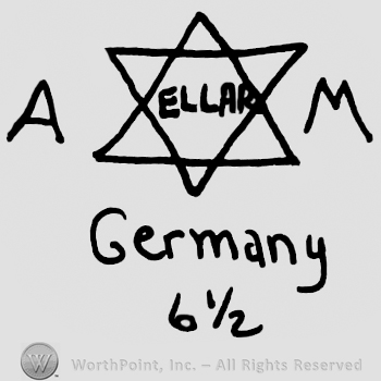 Uppercase A and M framing the star of David, Ellar written inside with uppercase letters, Germany written below with lowercase letters, number 6 1/2