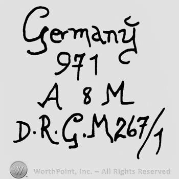 Germany written with lowercase letters over number 971, uppercase A and M framing number 8, uppercase D.R.G.M. followed by numbers 267/1