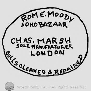 Rom E. Moody Soho Bazaar written with uppercase letters over Ch. AS. Marsh Sole Manufacturer London Dolls Cleaned & Repaired also written with uppercase letters, all inside an oval