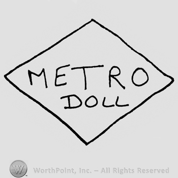 Metro Doll written with uppercase letters inside a diamond