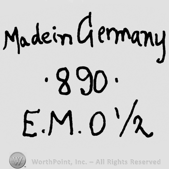 Made in Germany written with lowercase letters over number 890, uppercase E.M.O and number 1/2