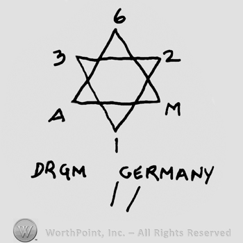 The star of David, numers and letters placed on each corner: 6, 2, uppercase M, 1, uppercase A and 3, DRGM Germany written below with uppercase letters