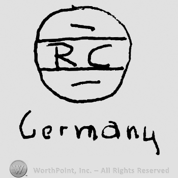 Uppercase RC inside a circle, Germany written below with lowercase letters