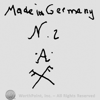 Made in Germany written with lowercase letters over uppercase N and number 2, uppercase A over two crossed forks