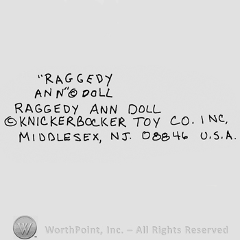 Raggedy Ann written with uppercase letters between quotation marks, the Copyright symbol, Doll Raggedy Ann Doll with uppercase letters, the Copyright symbol, Knickerbocker Toy Co. Inc. Middlesex, NJ, 08846, U.S.A.written with uppercase letters