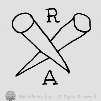 Crossed pins, uppercase R above, uppercase A below