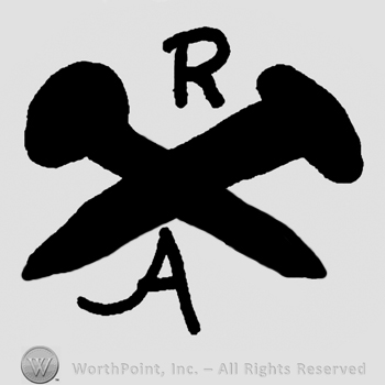 Crossed pins, uppercase R above, uppercase A below