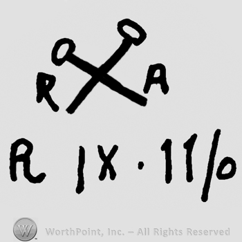 Crossed pins, uppercase R and A on sides over uppercase R, IX and number 11/0