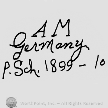 Uppercase AM over Germany P. Sch handwritten with lowercase letters, numbers 1899 and 10