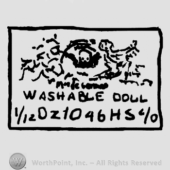 Complex design with Washable Doll written with uppercase letters, numbers and letters written below, all inside a rectangle
