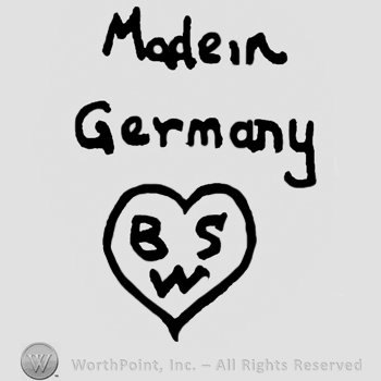 Made in Germany written with lowercase letters over a heart with uppercase BS over W written inside