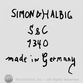 Simon & Halbig written with uppercase letters over uppercase S&C, number 1340 written below, Made in Germany written with lowercase letters