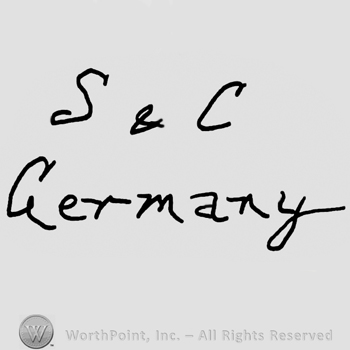 Uppercase S&C over Germany written with lowercase letters