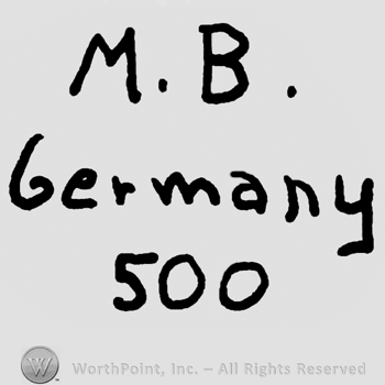 Uppercase M.B over Germany written with lowercase letters, number 500 written below