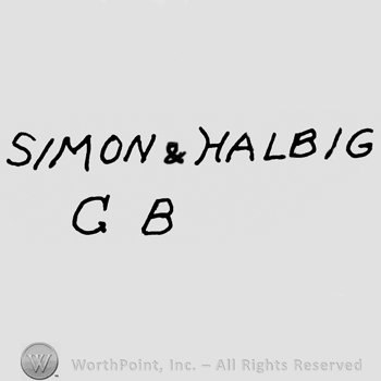 Simon & Halbig written with uppercase letters over uppercase GB