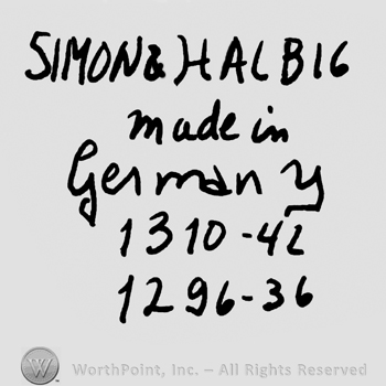 Simon & Halbig written with uppercase letters over Made in Germany handwritten with lowercase letters, Number 1310 minus 42, number 1269 minus 36