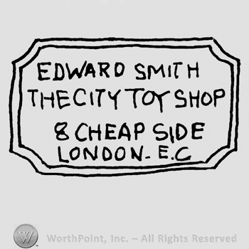 Edward Smith with uppercase letters over The city Toy Shop 8 Cheap Side London E.C.written with uppercase letters inside a double-line rectangular shaped design