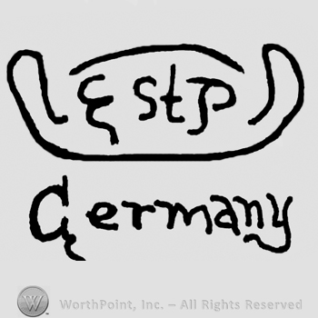 Uppercase E, lowercase ST, uppercase P on a stylized recipient, Germany written below with lowercase letters