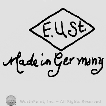 Uppercase E.U.St.inside a triangle over Made in Germany handwritten with lowercase letters