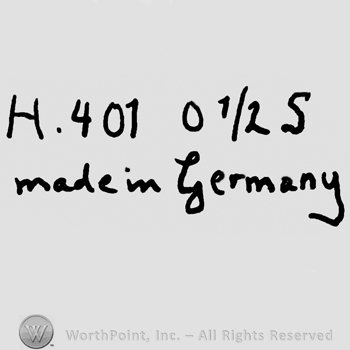 Uppercase H, number 401, zero, 1/2 and uppercase S, all over Made in Germany handwritten with lowercase letters