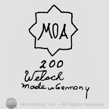 MOA written with uppercase letters inside a star design, number 200 written below, Weloch Made in Germany handwritten with lowercase letters