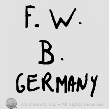 Uppercase F.W. over uppercase B and Germany written below with uppercase letters