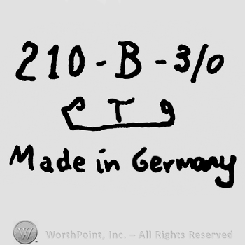 Number 210 minus uppercase B minus number 3/0 over uppercase T underlined with an ornamented line, Made in Germany written below with lowercase letters
