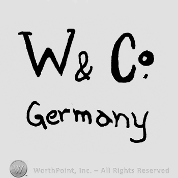 Uppercase W&Co over Germany written with lowercase letters