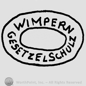 Wimpern Gesetzelschulz written with uppercase letters around an oval design