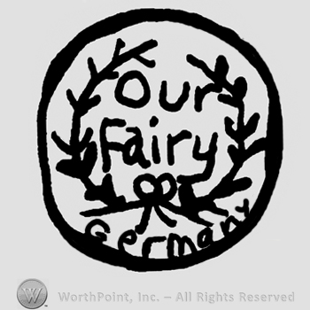 Our Fairy written with lowercase letters and surrounded by ornamental branches, Germany written below with lowercase letters, all inside a circle